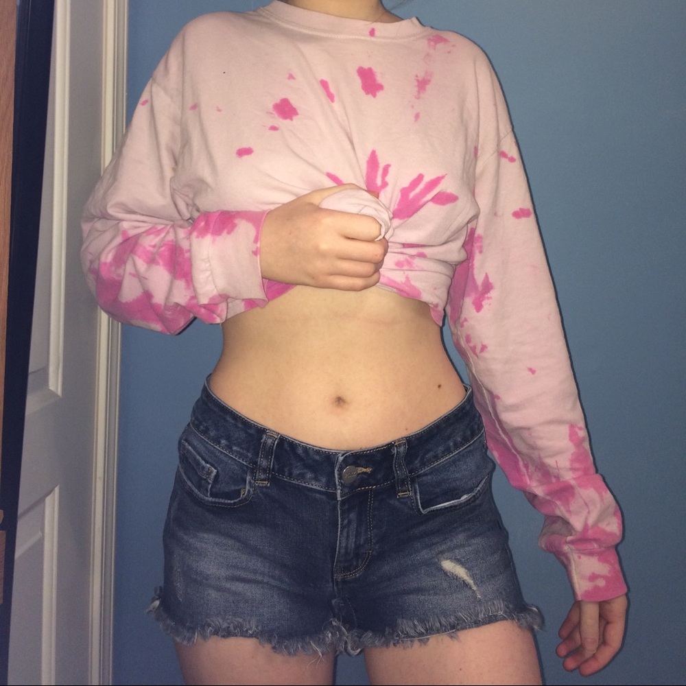 Dark blue denim shorts.